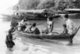 Thailand: Chao Thalae 'Sea Gypsy' women and children with boats, Phuket, c.1960